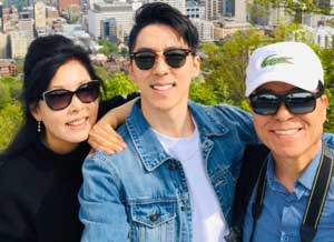 Dr John Yoo with his parents