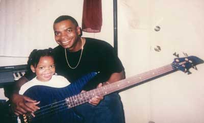 Kelly stamps with her father